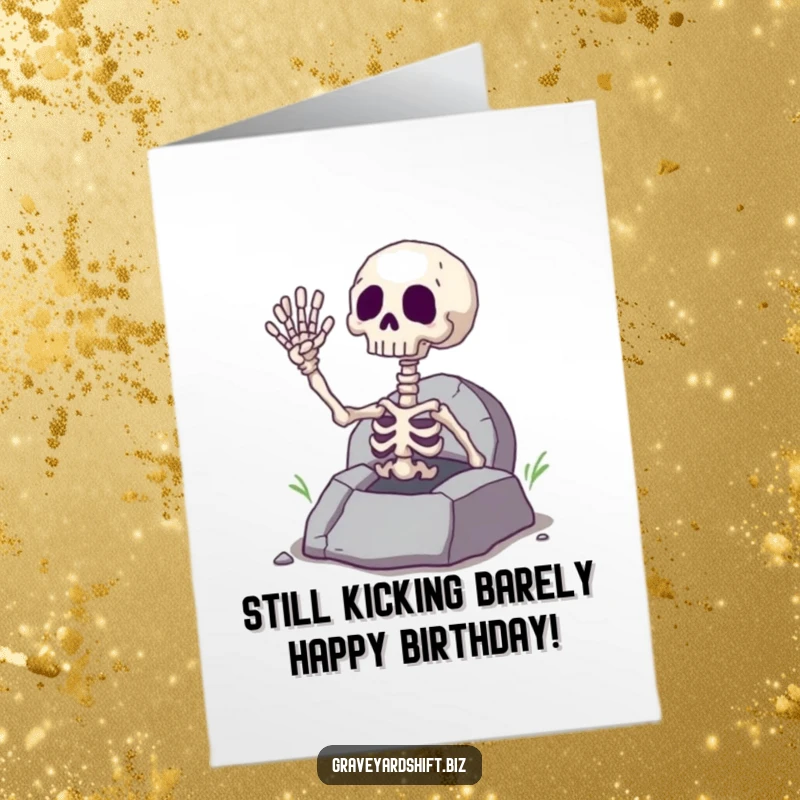 Funny Free Printable Birthday Card: Giggling skeleton hand emerging from cracked grave, waving merrily.